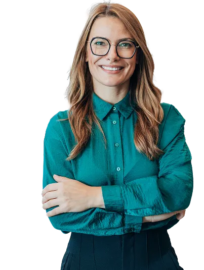 Smiling association member standing with arms crossed